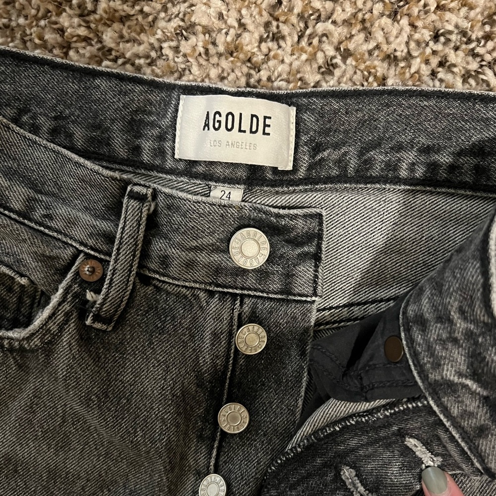 Agolde distressed black jeans. Size 24